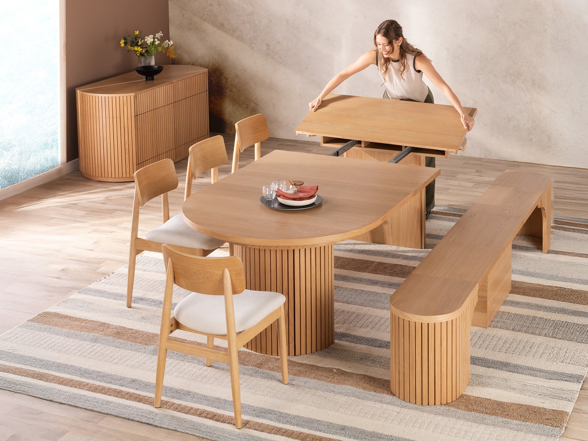 Transformer-round-table-scandinavian-oak-the-host-functionality-lifestyle-model-4x3-1 Round Dining Set - The Host - Image 1